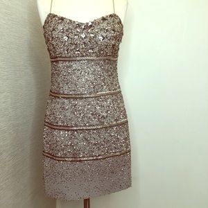 All beaded silver Aidan Mattox dress